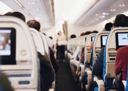 shallow focus photography of people inside of passenger plane